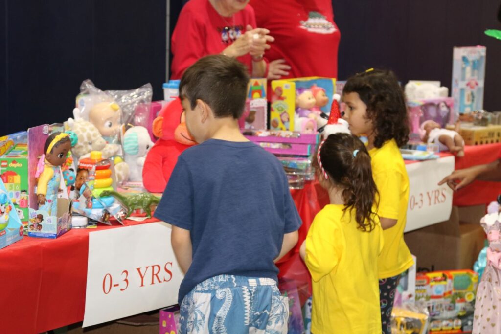 kids looking at toys